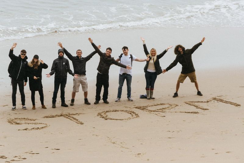 Storm employees on the beach